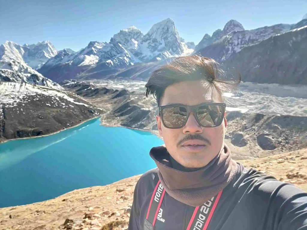 nomadicnepali, a trekker from Nepal picturing with Gokyo Lake