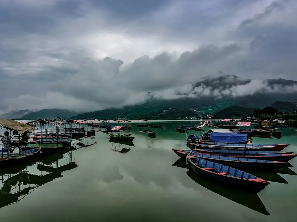 colorful boats floating on the Phewa lake, Pokhara.
