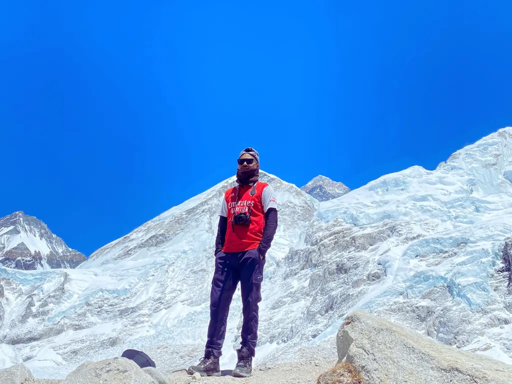 Nomadicnepali on the everest region trek with Mount everest on the background