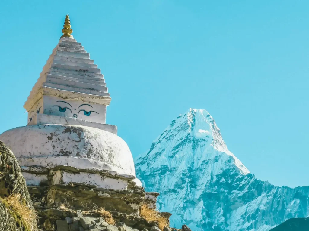 white religious stupa on the way to Everest base Camp Trek